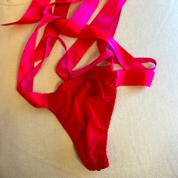 Victoria's Secret Other - NWOT Victoria’s Secret red and Barbie pink ribbon thong one size